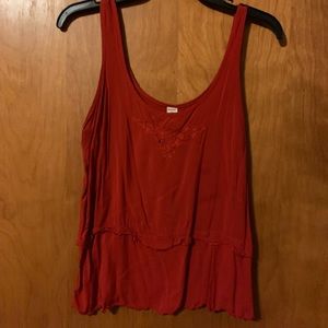 Burnt orange silky tank blouse.